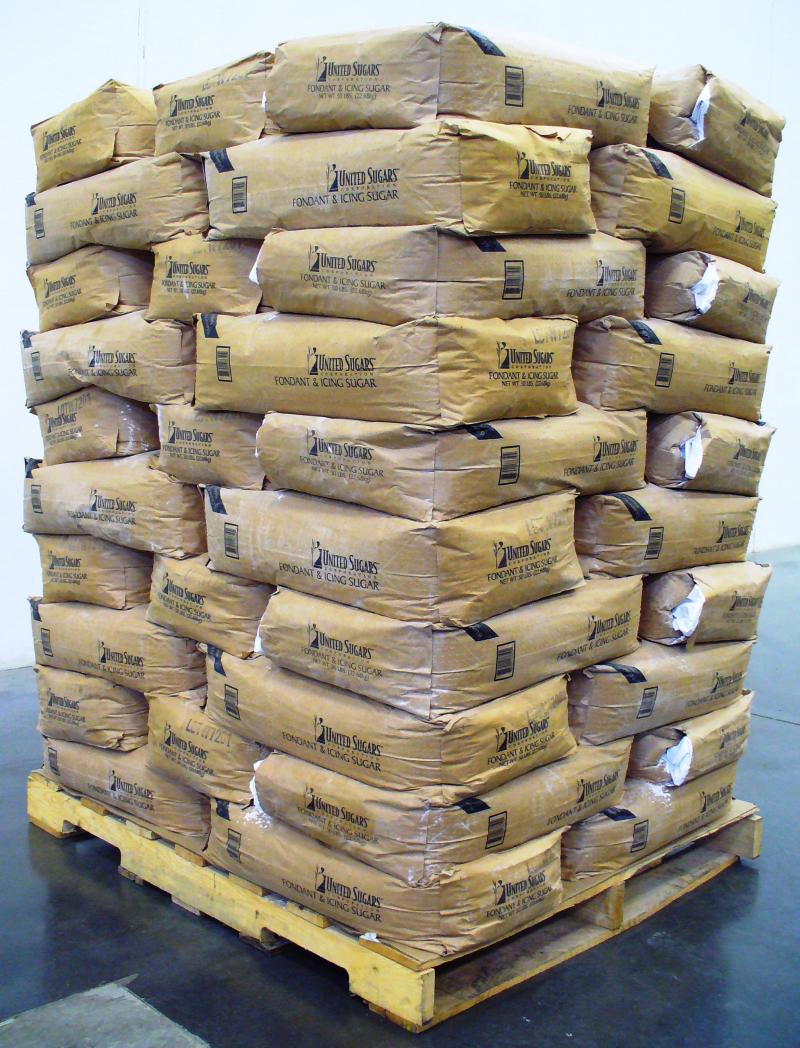 50 pound valve bags of powder sugar stacked by a robotic bag palletizer in ND